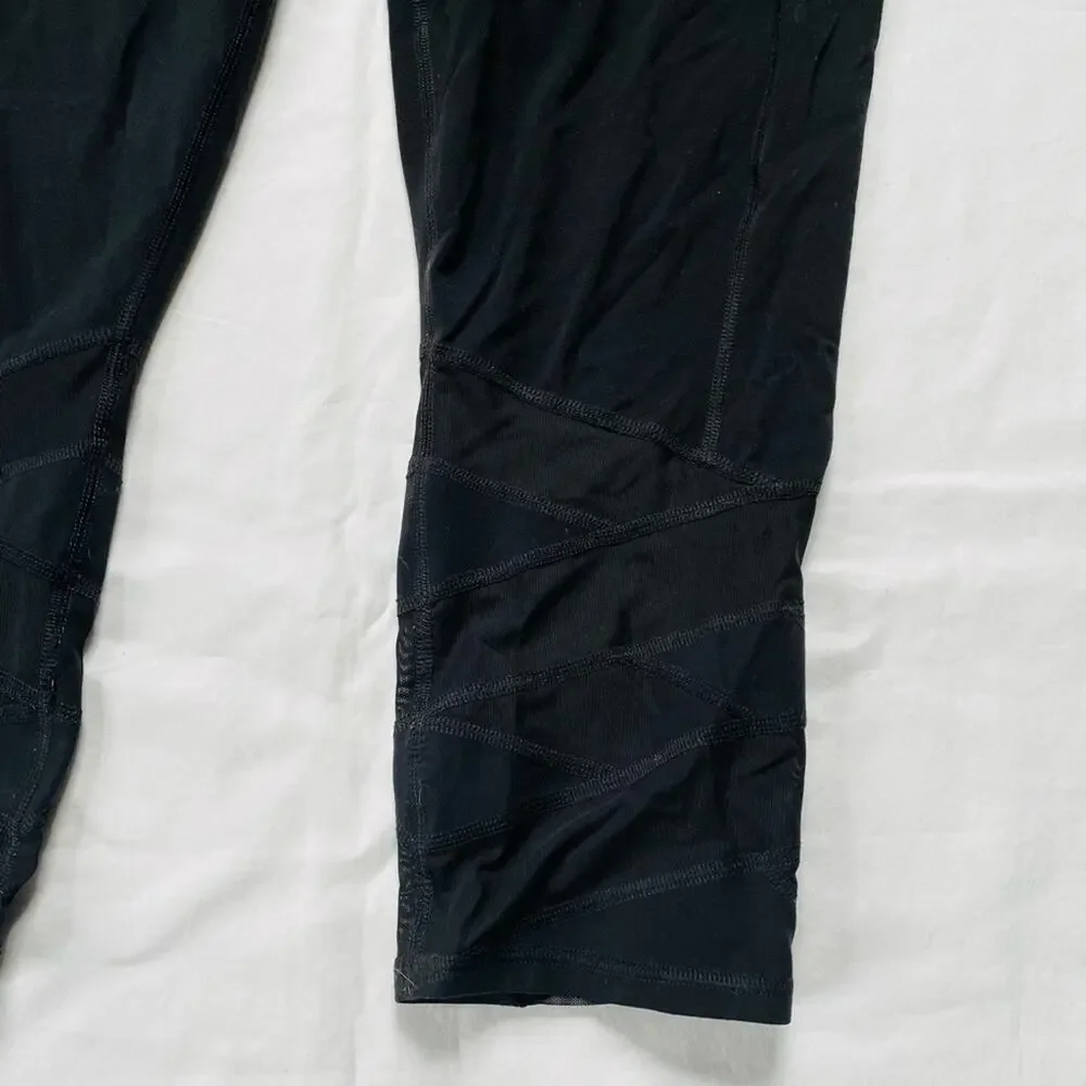 Black Athleta Leggings with Mesh Inserts